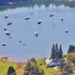 aerial view of the house and the harbor with sailboats